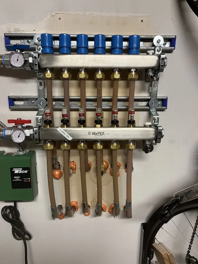 Plumber performing Water Heater Repair at a residential property in Shelby